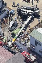 Crane topples at Tokyo construction site