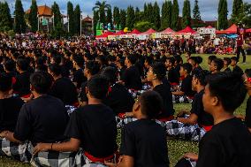 Balinese Student Performers Present The Kecak Dance During The National Education Day