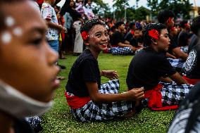 Balinese Student Performers Present The Kecak Dance During The National Education Day