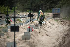 Mostly Unmarked Graves Of People Who Died In Kyiv Region