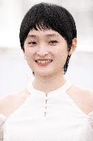 He Bian De Cuo Wu (Only The River Flows) Photocall  Cannes - Day 5.