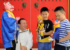 Traditional Puppet Art Popular In China