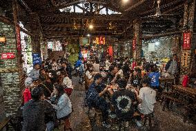 Citizens Drink Tea And Chat at An Antique Teahouse in Chongqing