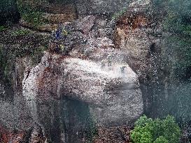 Workers Reinforced A Rock In Yichang