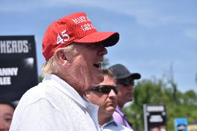 Former U.S. President Donald J. Trump Visits The Driving Range, Meets Fans And Watches LIV Golf Washington DC 2023 Round 2