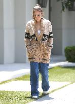 Jennifer Lopez Wears A Comfy Belted Cardigan - LA