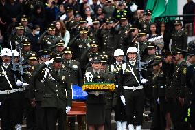 Funeral honors police officer killed in attack in Tibu, Colombia