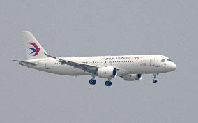 China's 1st domestically made plane makes maiden commercial flight