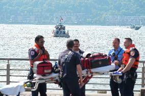 Water Rescue For A Possible Drowning Victim At Pier 84