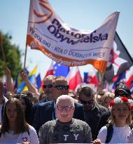 Thousands Join Opposition March In Warsaw