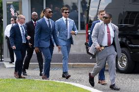 Kansas City Chiefs running back Isiah "Pop" Pacheco and quarterback Patrick Mahomes walk to the White House