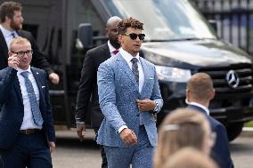 Kansas City Chiefs running back Isiah "Pop" Pacheco and quarterback Patrick Mahomes walk to the White House