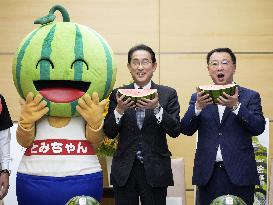 Japan PM Kishida treated to watermelon