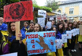 Protesters Demand Recognize The Blowing Of The Dam At The Kakhovka Hydroelectric Power Plant As A War Crime, Amid Russia's Invas