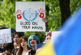 Protesters Demand Recognize The Blowing Of The Dam At The Kakhovka Hydroelectric Power Plant As A War Crime, Amid Russia's Invas