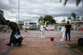 Forensic Police Recovers Evidence After Two Police Officers Hit By Explosive During Clashes In Colombia