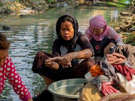 Indonesia: Residents Choose Polluted River Water To Conserve Clean Water