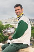 French Open - Novak Djokovic Poses With His Trophy