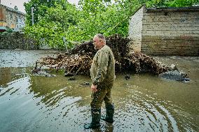 Rescue Works In The Flooded Homes Of People ffAected By The Destruction Of The Nova Kakhovka