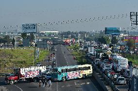Scrap Metal Dealers Blockade And Demonstrate On State Highway