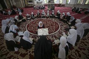 Palestinian Girls Study The Holy Koran