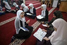 Palestinian Girls Study The Holy Koran