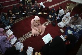 Palestinian Girls Study The Holy Koran