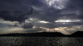 Dark Clouds A General Over the Anasagar Lake - India