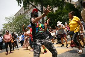 Juneteenth Celebration At Black Lives Matter Plaza