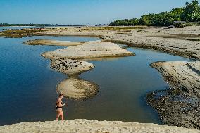 Lowering Of The Water Level Of Dniper River In Zaporizhia After The Collapse Of The Downstream Nova Kakhovka Dam