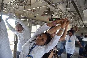 International Yoga Day In Suburban Train In Mumbai