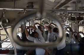 International Yoga Day In Suburban Train In Mumbai