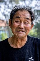 74 Years Old Farmer Graduated From University In Anyang