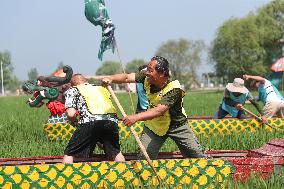 CHINA-LIAONING-SHENYANG-PADDY FIELD-DRAGON BOAT RACE (CN)