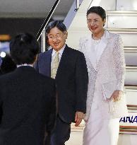 Japan emperor, empress return home