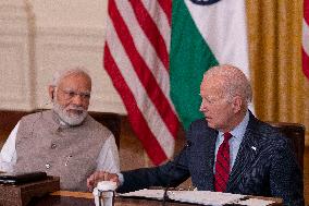 President Joe Biden and Prime Minister Modi of the Republic of India make statements during a meeting with senior officials and