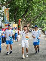 (SP)CHINA-CHONGQING-WORLD UNIVERSITY GAMES-TORCH RELAY(CN)