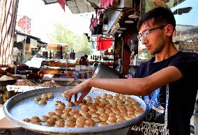 SYRIA-DAMASCUS-SWEETS-EID AL-ADHA