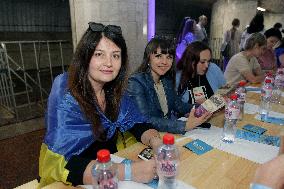 Dnipro residents write dictation in subway on Constitution Day