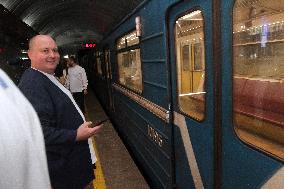 Dnipro residents write dictation in subway on Constitution Day