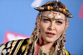 Madonna Postpones Tour After Suffering Serious Bacterial Infection