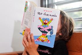 Little Girl Reading - France