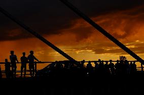 People Enjoying Sunset View In Kashmir