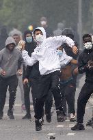 Protesters clash with police after the commemoration march for Nahel - Nanterre