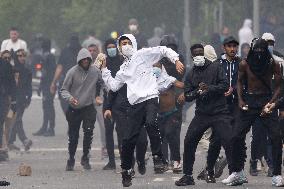 Protesters clash with police after the commemoration march for Nahel - Nanterre