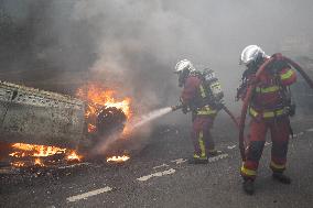 Protesters clash with police after the commemoration march for Nahel - Nanterre