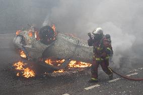 Protesters clash with police after the commemoration march for Nahel - Nanterre