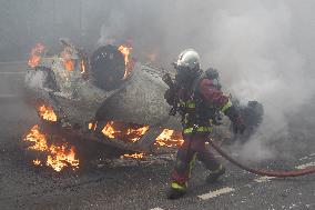 Protesters clash with police after the commemoration march for Nahel - Nanterre