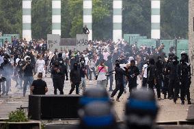 Protesters clash with police after the commemoration march for Nahel - Nanterre