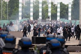 Protesters clash with police after the commemoration march for Nahel - Nanterre